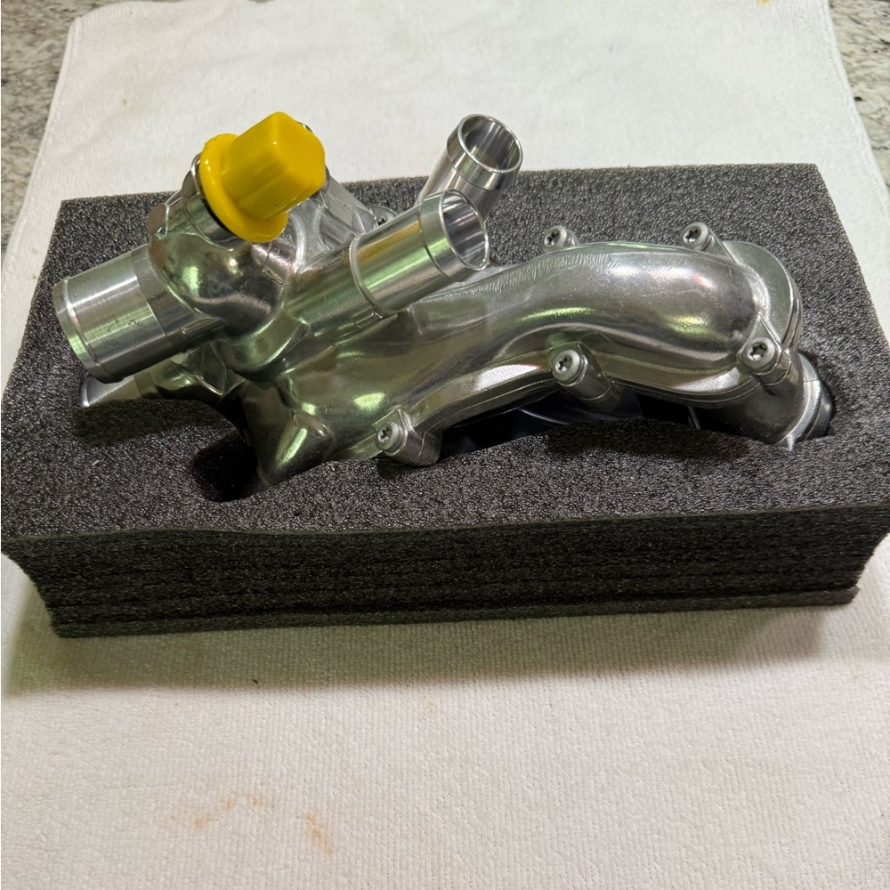 Aluminum thermostat housing for Mini Cooper